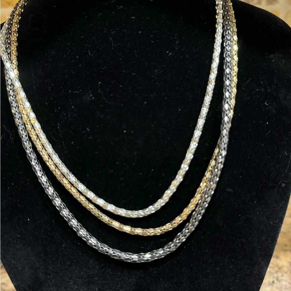 Necklace 3 Strand looks like Gold Silver Platinum. 16 to 20 in adjustabl…
